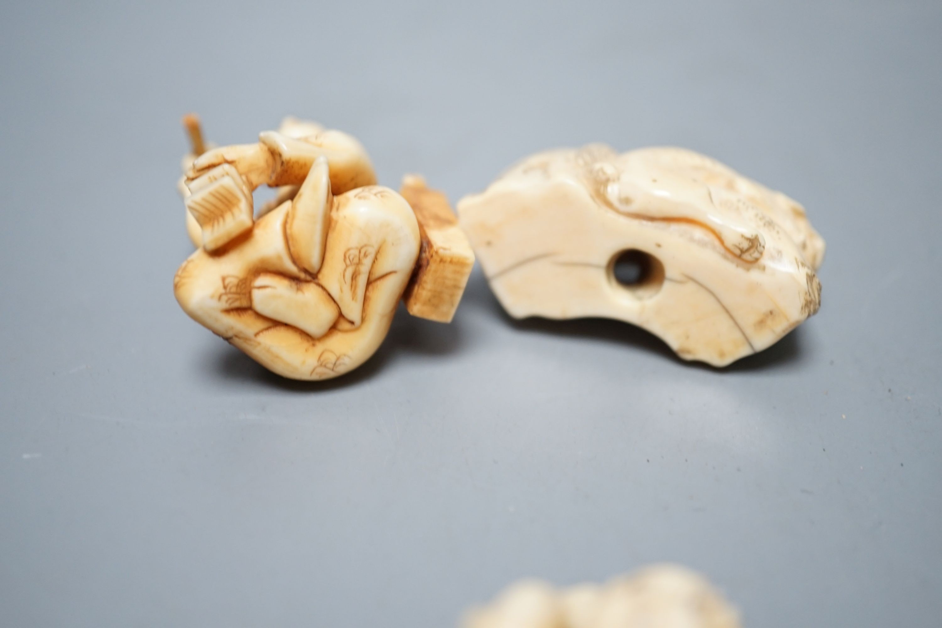 A collection of eight Japanese Ivory and bone Netsuke and okimono, 19th/early 20th century